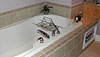 Tub, tile enclosure, and fixtures